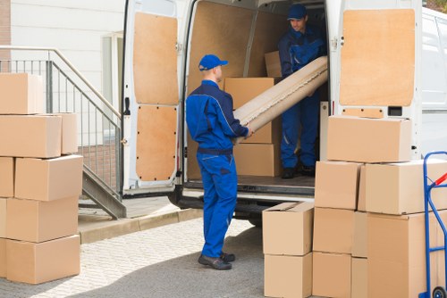 Packers organizing boxes in a Greenwich home